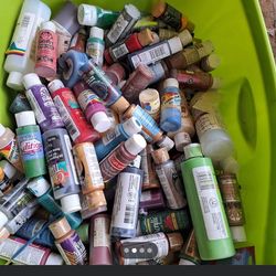 Large bin full with acrylic paints
