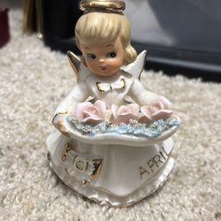 April vintage figurine
