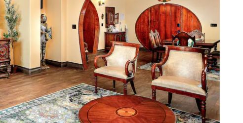 4 curved decorative wood chairs with cushions .  the pics are from an airbnb .  chairs are in shed