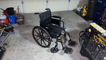 Walkers, wheelchair and adjustable over the toilet chair.
