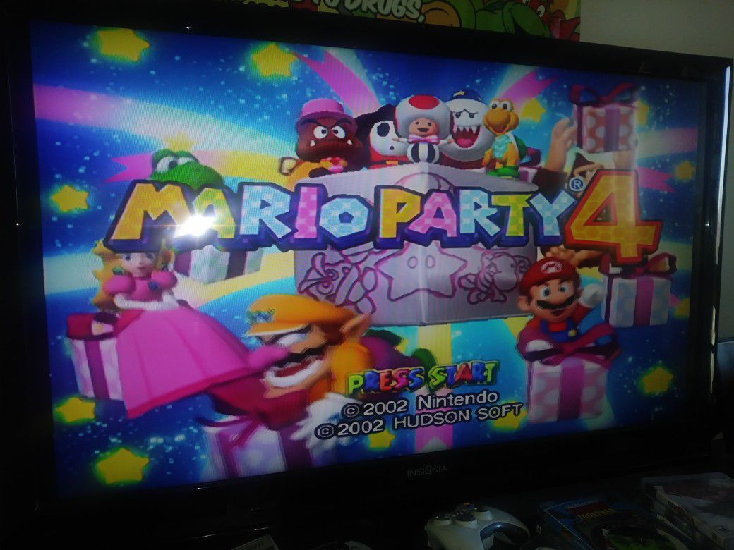 Gamecube with Zelda Twilight Princess & mario party 4 loose.