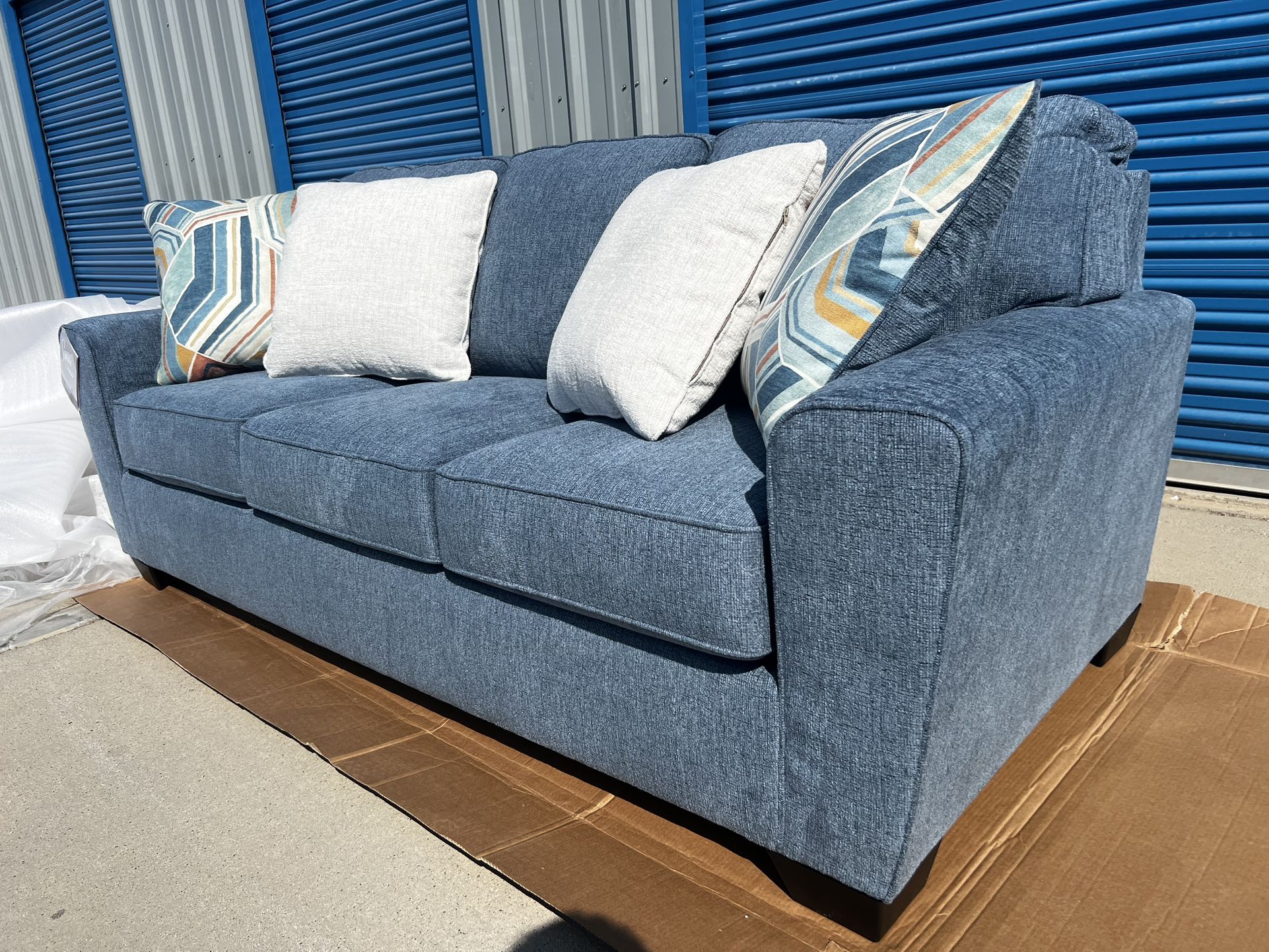 Brand New. Ashley Sofa. Blue. Only 1 Available. $449 