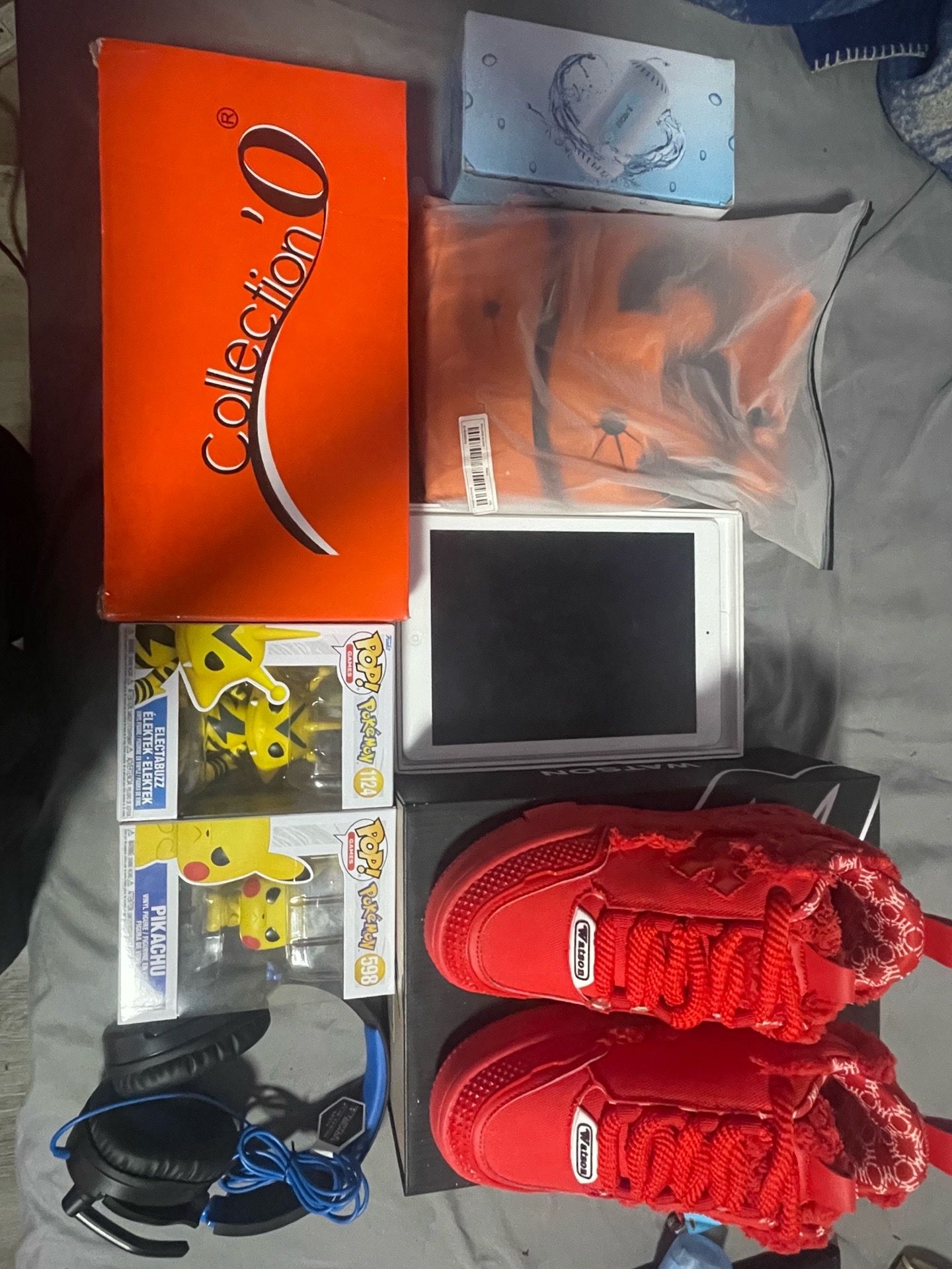 Red Watson Sneakers, Watson Tablet, Turtle Beach Gaming Headphones, and Pokemon Funko Pops