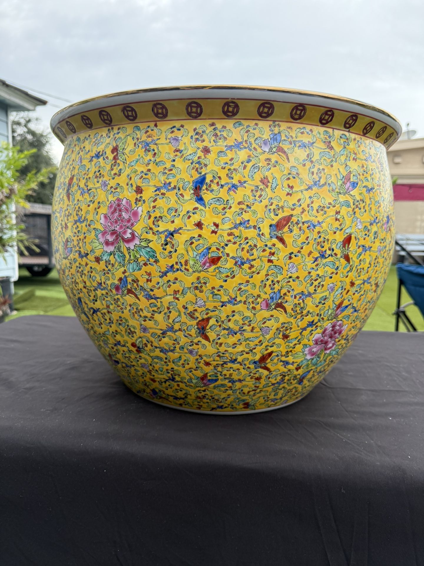 A Large Chinese Porcelain Yellow Fish Bowl Painted With Pastel Peonies & Butterflies 20"H X 15"H