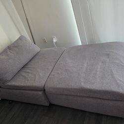 Gray modular ottoman and sofa set