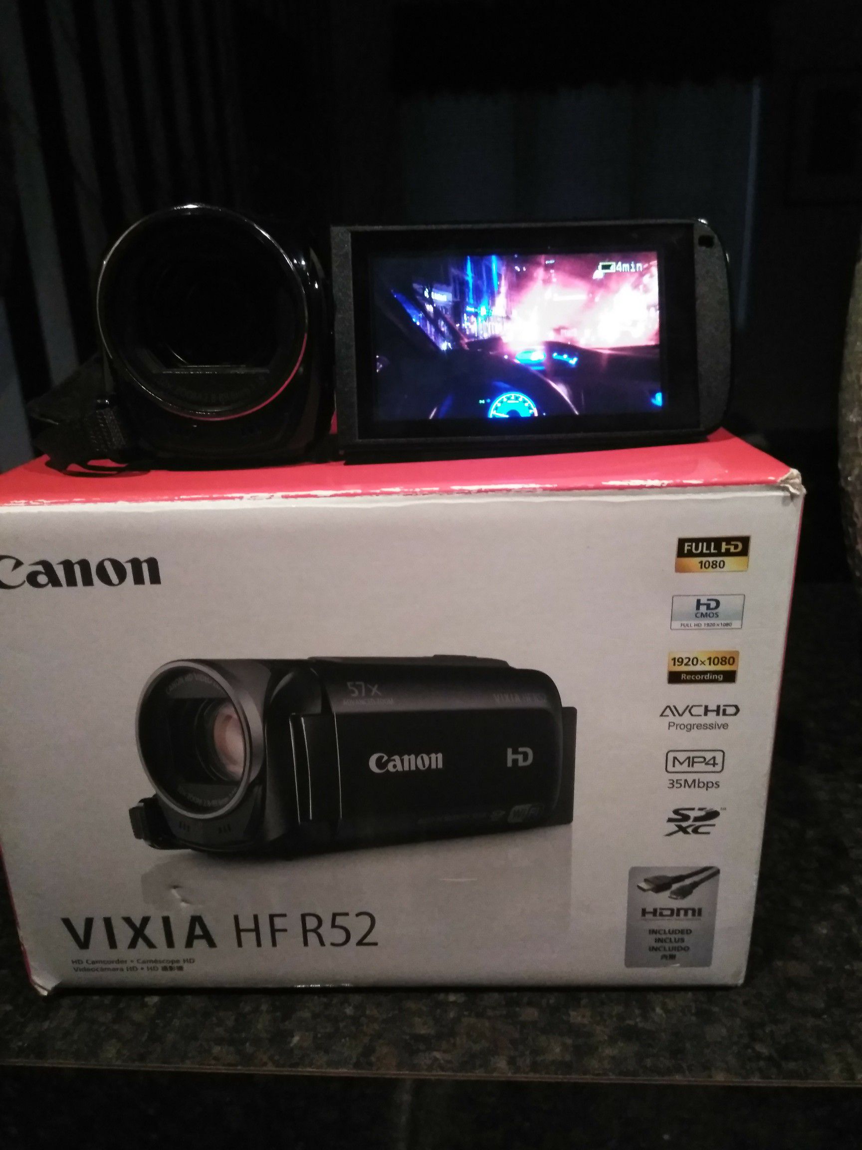 Black Canon Vixia HF r52 HD Flash Memory Camcorder, with box and all attachments. AWESOME CAMCORDER.