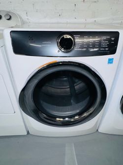 Electrolux electric dryer: a receipt for a 90-day warranty.