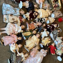 50 Porcelain  Dolls  Some Have Stands 