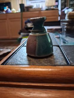 small, speckled blue and tan Kaplan studio art pottery vessel