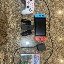 comes with the game minecraft and comes with controller 