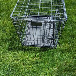24" Metal Dog Crate With 3 doors And Is Collapsible 