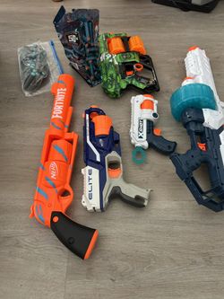 3 X-Shot blasters, 2 nerf blasters ( with bullets)