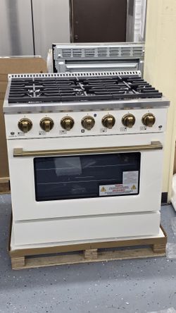 Brand new 36-in 6 burner gas range and white and brass Trim