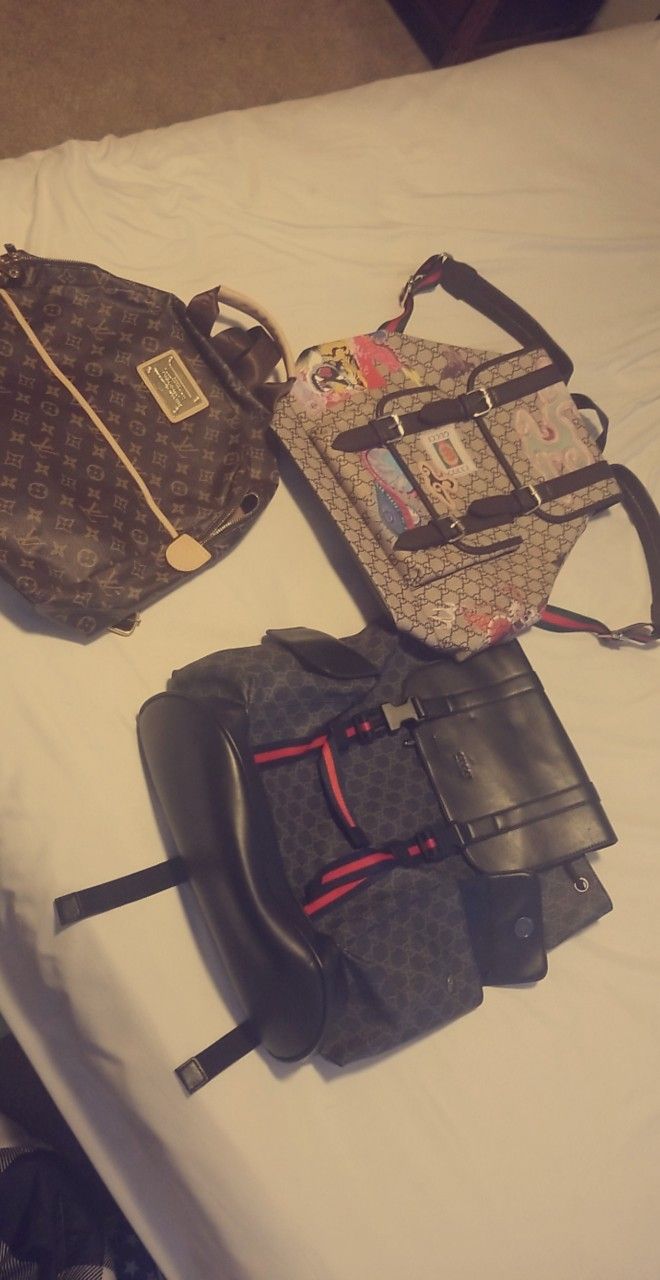 3 Designer Backpacks. 2 Gucci Supreme Backpacks And 1 Louis Vuitton Backpack