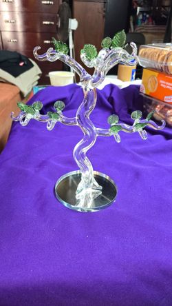 Decorative Glass Crystal Tree Featuring Green Leaf and Hooks for Hanging Accents on a mirrored round base.