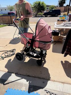 Pink baby stroller