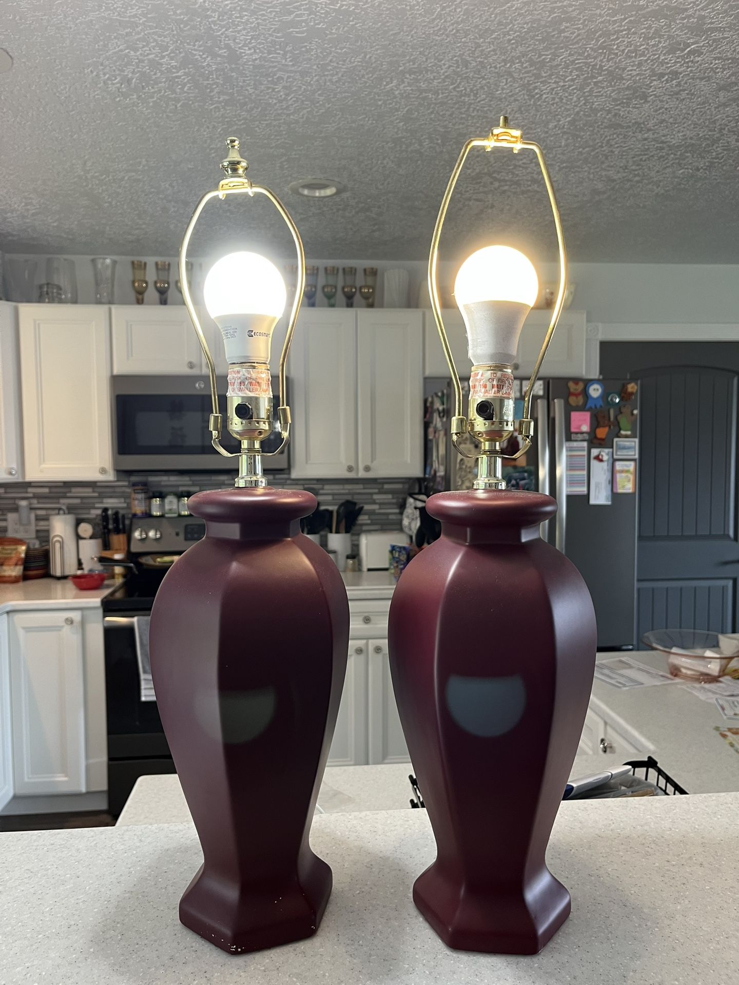 Set of two burgundy colored lamps