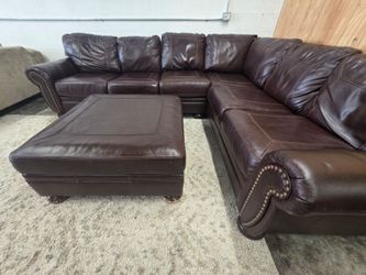 Premium Leather Sectional & Large Matching Ottoman

Delivery options Available