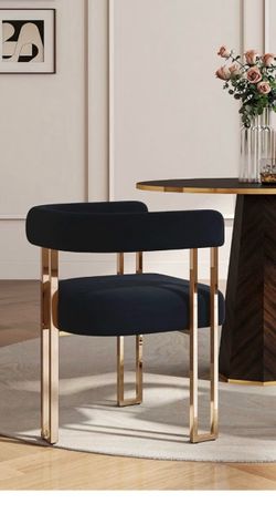 Modern black boukle barrel chair with gold legs