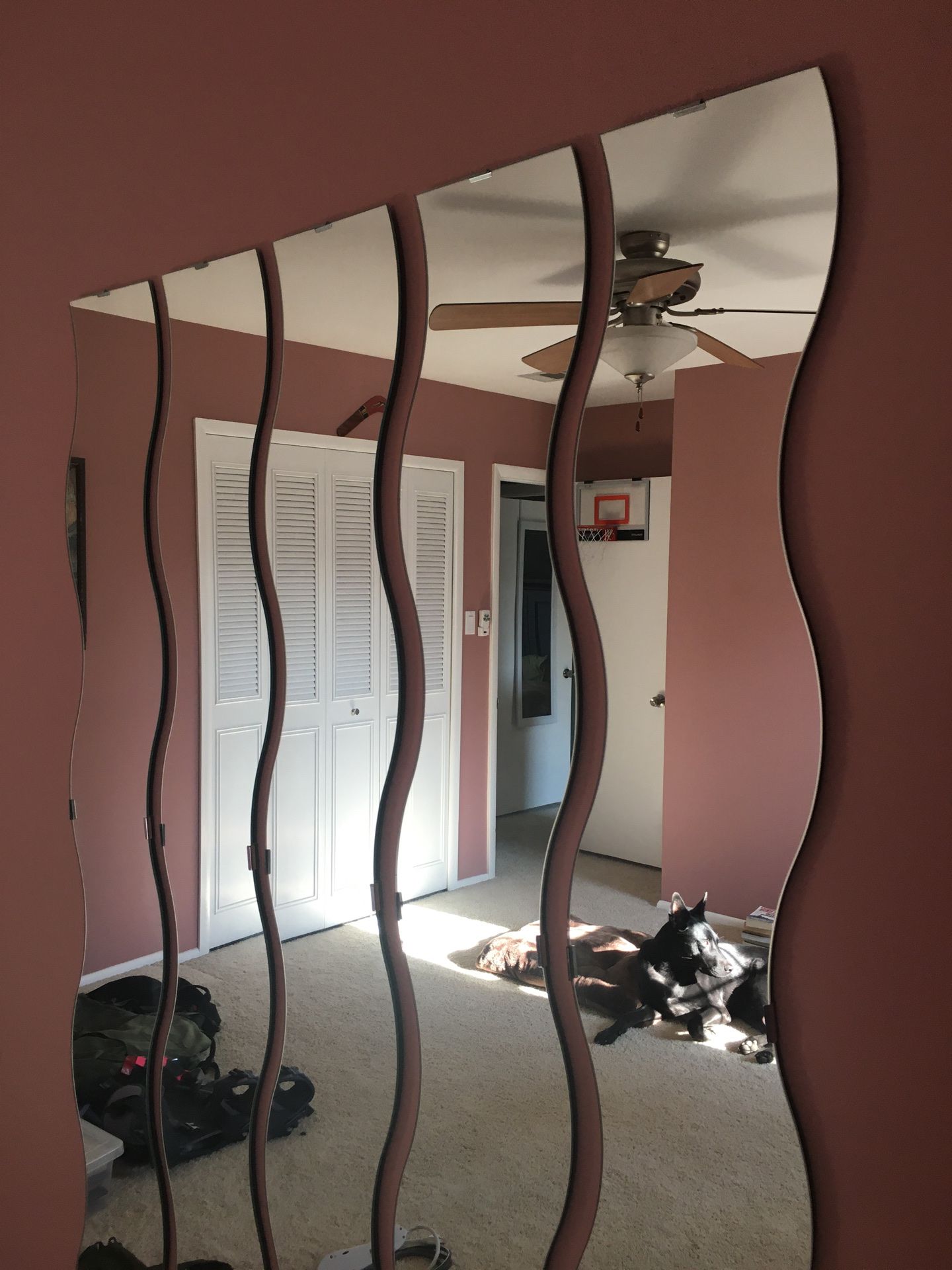 Five large wavy wall mirrors
