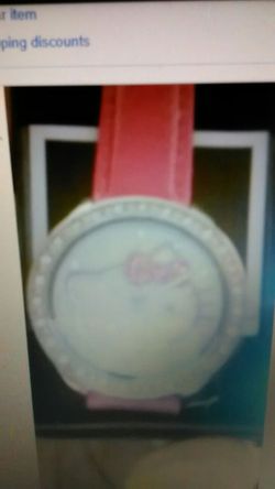 Brand new in box, Avon Hello Kitty Sparkling case watch pink band rhinestones