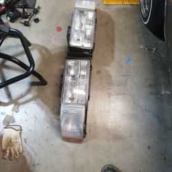 CADILLAC FLEETWOOD HEADLIGHTS OEM