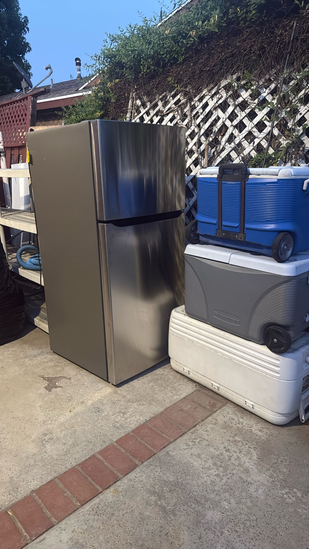 24 cu. ft. Top Mount Freezer Refrigerator with Multi-Flow Air System in Stainless Steel, Garage Ready
