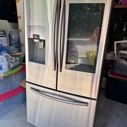 Samsung refrigerator with touchscreen.