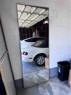 Mirror closet doors (2x)