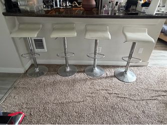 4 white set stools (have some tears but fixable