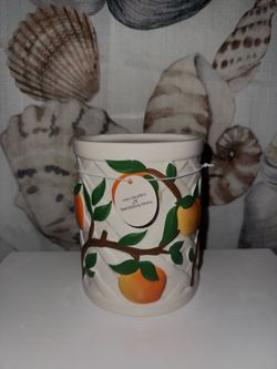 Peach ceramic 3-wick candle holder