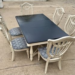 Beautiful craftsmanship, solid, heavy real wood dining table and chairs