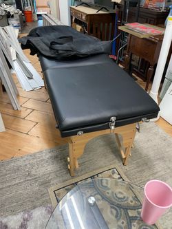Massage table