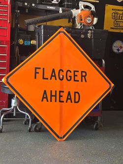 Safety sign-FLAGGER AHEAD