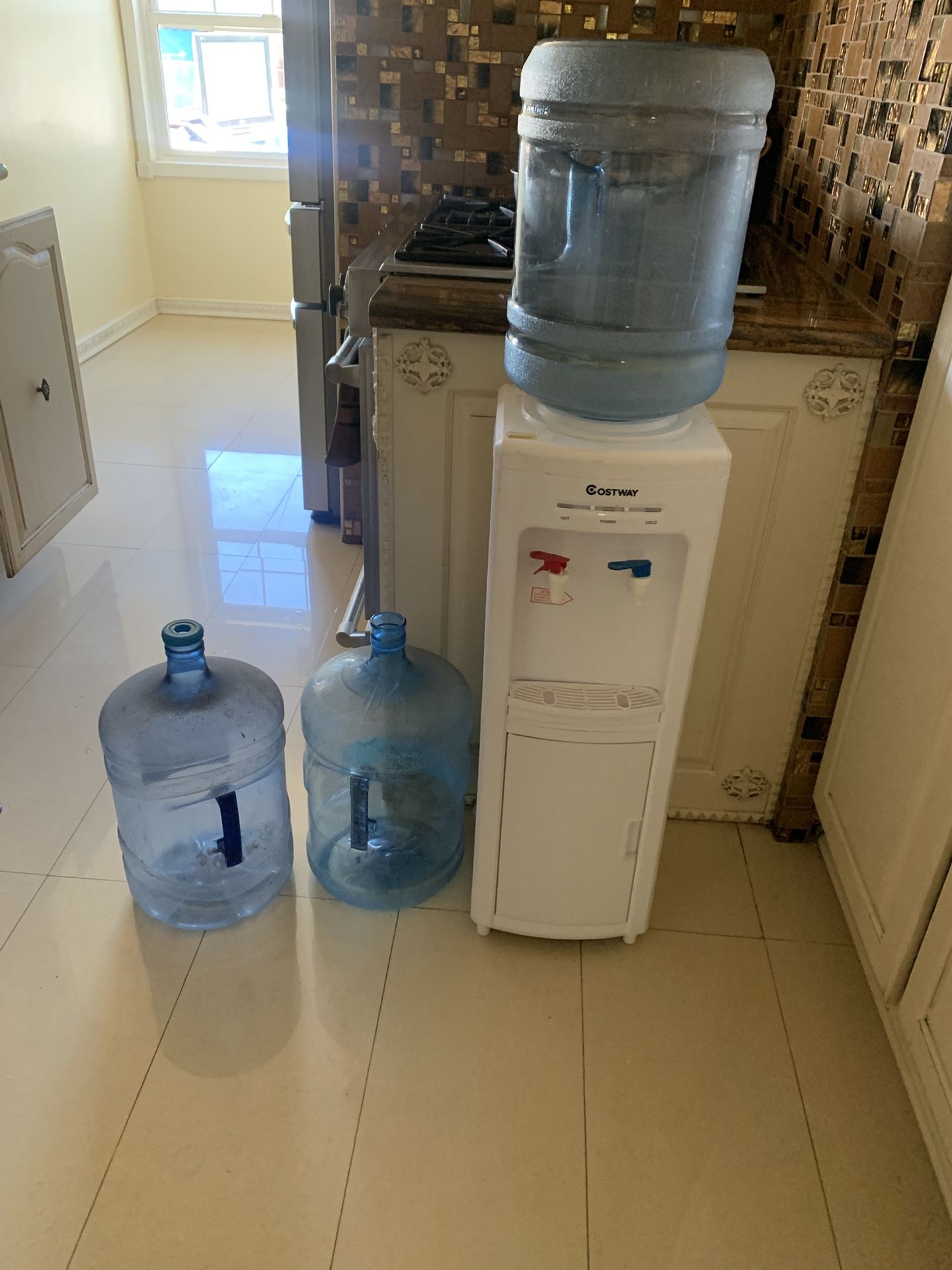 Water Dipenser And Water Bottles All $40