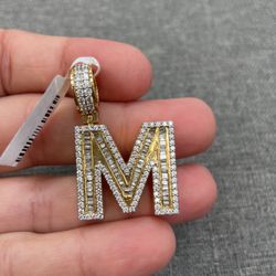 Charm 10k Yellow Gold With Roun And Bugget Diamonds 