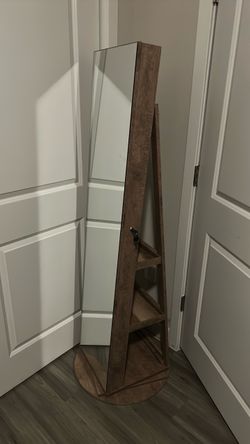Swivel jewelry armoire w mirror (inside as well)