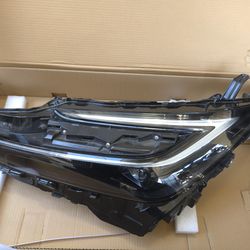 2024 Toyota Prius driver side headlight one tab is missing