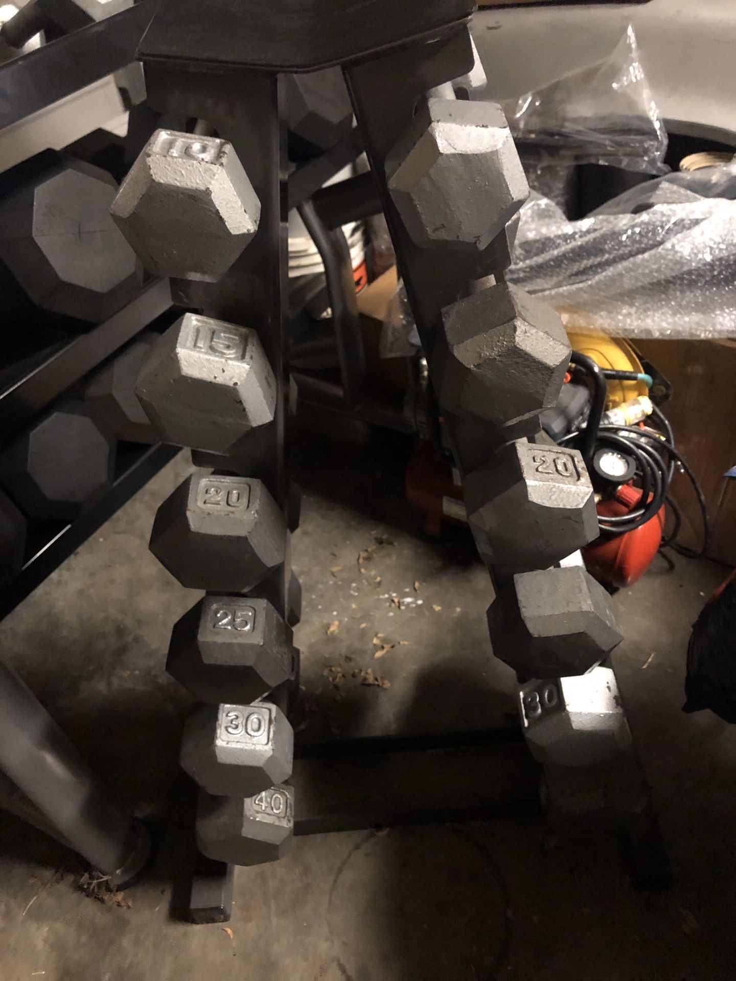 Dumbbells, racks, curl bar with weight plates for Sale in Dallas, TX OfferUp