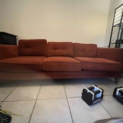 3 Seater Dark Red/Orange Couch.Less Than Year Old 3,500$ 