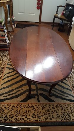 Antique coffee table ...sides drop!