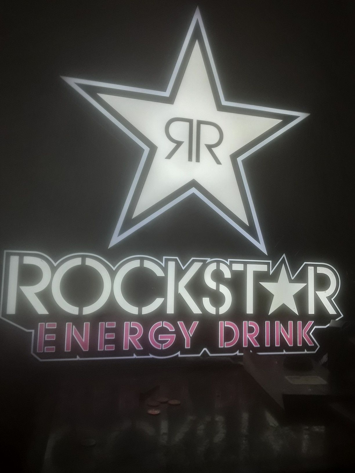 Rockstar energy light works perfect great for bedroom garage or man cave no cracks its perfect