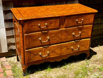 French style four drawer dresser with diamond patterns