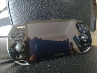Moderately dinged up ps vita (works, no charger)