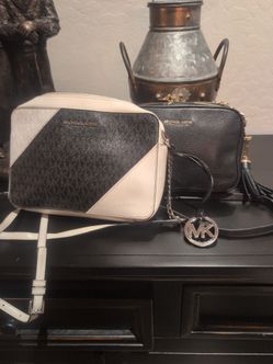 2 Michael kors gently used purses both for $200.