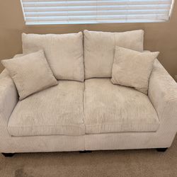 White ribbed couches