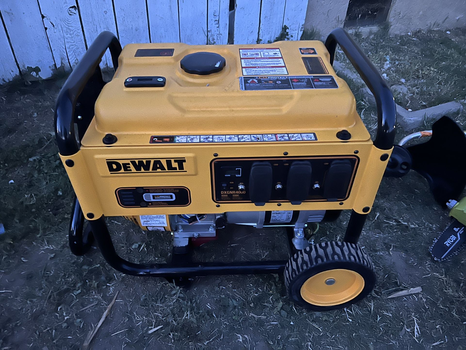 DEWALT 4000-Watt Manual Start Gas-Powered Portable Generator with Premium Engine, Covered Outlets and CO Protect