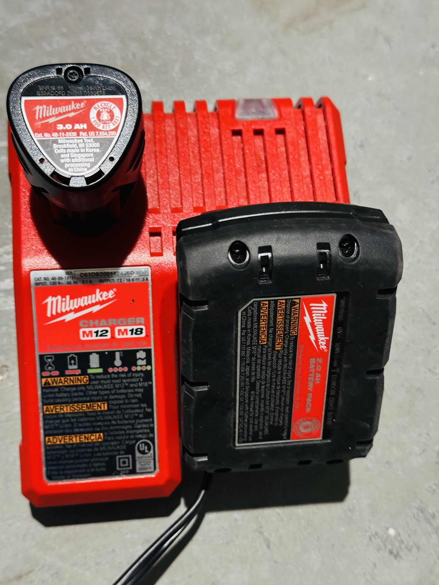 Milwaukee charger and battery combo m12 3.0 AH, m18 2.0 AH