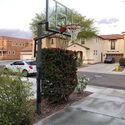 Goaliath 54 inch in ground basketball hoop, adjustable basketball court 
