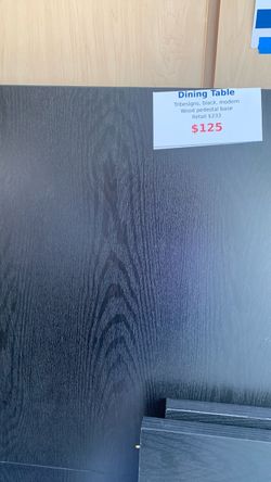 Black Extendable Dining Table, Seats 4 to 8.